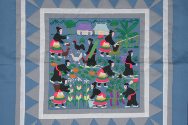 Story cloths reflect both the Hmong embroidery tradition (paj ntaub) and the experience of Hmong refugees during the Vietnam War. Thousands of Hmong fled Laos after the fall of Saigon in 1975. Hmong story cloth, 2006-2011.  Connecticut Museum Collection, Gift of Boua Tong Xiong and the Hmong Community of Connecticut, 2015.200.4.